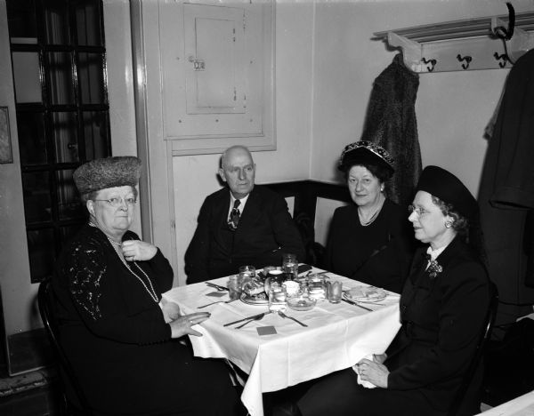Four people attending the Harold E. Stassen campaign luncheon in Monroe. Seated (left to right), are Mr. and Mrs. B.H. Roderick, Brodhead: Mrs. May Luchsinger, Monroe; and Mrs. Burt Lynch, Monroe.