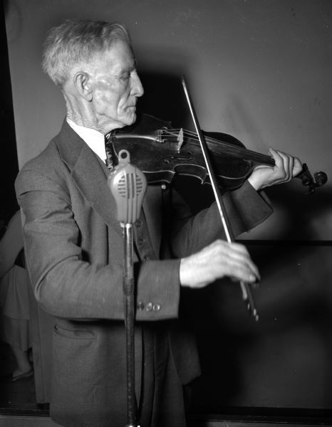 Martin Christiansen of Edgerton, the oldest fiddler at the Old-Time Fiddlers contest at the Madison Community Center. He is 77 and has been playing almost 35 years.