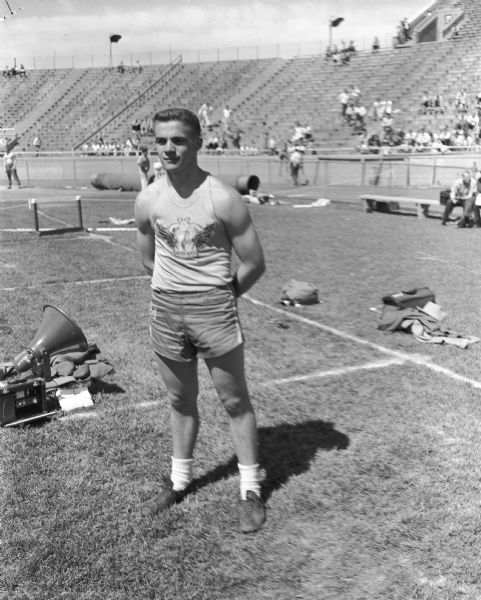 Art Schulz from Madison West High School, class A champions at the state high school track meet at Camp Randall Stadium. He won the shot put event.