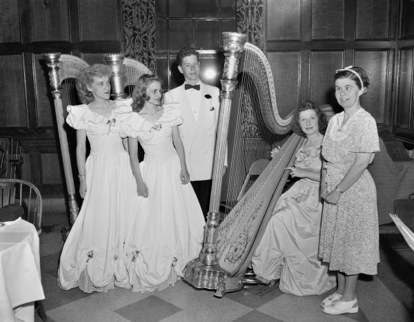 Harps of Harmony members, shown left to right are: Carole Branley, Virginia Severson, Stanley Stitgen, Margaret Rupp Cooper, and Sybal Hanks, composer of their piece, "Meditation".