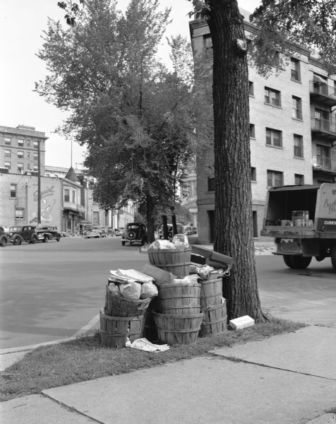 Uncollected garbage in bushel baskets on Capitol Square during a walkout strike by Local 236 Municipal Garage Department Union.