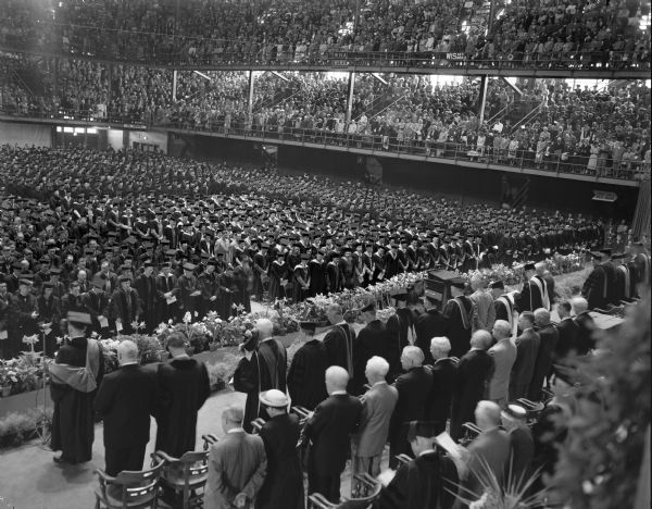 ON eof four images used to create a panorama of the audience and graduates taken from the stage of the Field House at the University of Wisconsin-Madison Commencement ceremonies.
