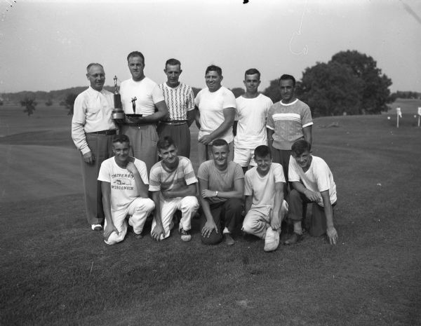 The Nakoma Country Club golf team who won the city team championship. First row, left to right, are Billy Hilsenhoff, Tom Mould, Doug Koepcke, Bob Bruce and Billy Milward. Second row, left to right, Walter Rhodes, donor of the championship trophy, Bill Garrott, Harland Reich, Frank "Moon" Molinaro, Bill Vea, and Steve Caravello.