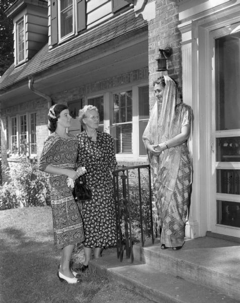 Women representing Presbyterian churches of Madison attended the garden party given at the home of Mrs. W.H. Conlin, 739 Farwell Drive, in honor of Mrs. Howard E. Anderson, missionary on furlough from India. Shown left to right are: Mrs. Richard E. Pritchard, wife of the minister of Westminster church, and Mrs. P.A. Hauver, president of Christ Church women's society and Mrs. Anderson.