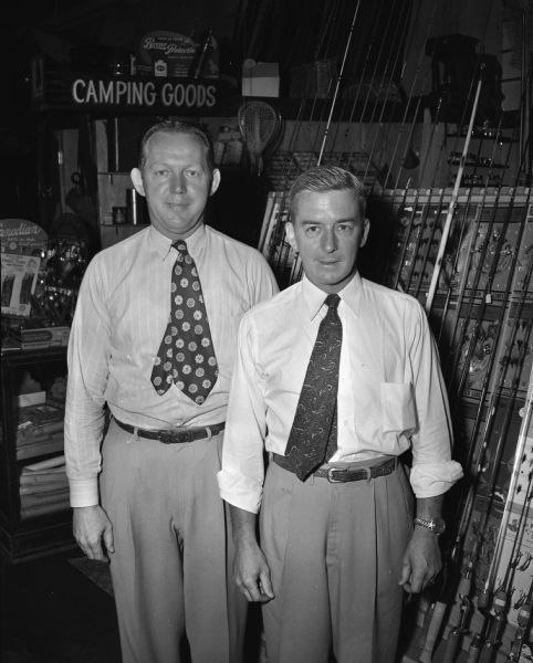 Leo A. Peterson, 2135 East Mifflin Street, at left, and William H. Kelly, 127 West Wilson Street, right, newly appointed vice-presidents of the Wisconsin-Felton Sporting Goods Company. Both men have been associated with the firm for twelve years.