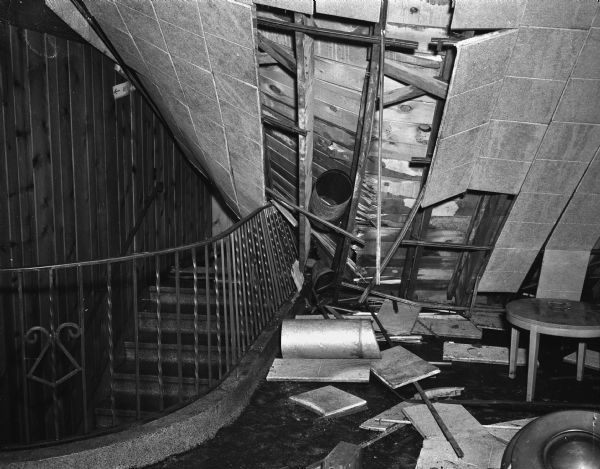Flood damage, including a collapsed ceiling, to the interior of the Lark Cocktail Lounge at 2554 University Avenue.