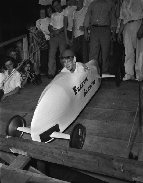 The Grand Champion Winner Frankie Meyers, son of Mr. and Mrs. David Meyers, 310 West Dayton Street, is shown sitting in his White Racer.