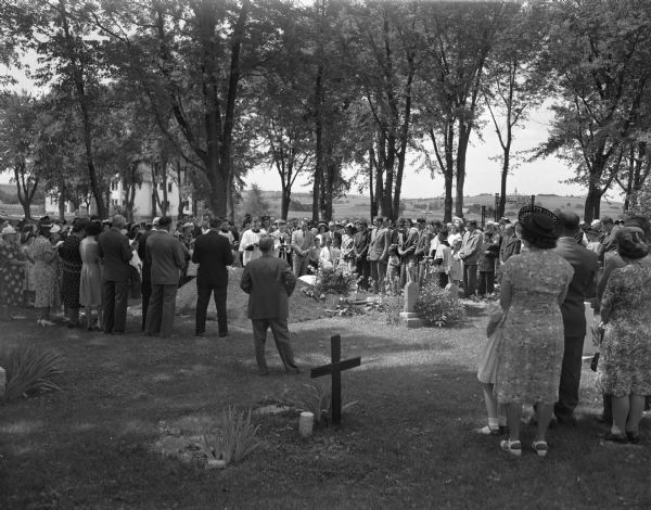 Scene in the cemetery near Martinsville during the internment of Lucille Ballweg, victim of a tornado.