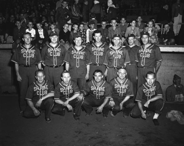 Group portrait of the Zor Shrine softball team in uniform during the  Knights of Columbus - Zor Shrine Softball Show at Breese Stevens Field.