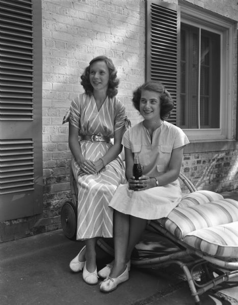 Two young women from Shorewood Hills soon to leave for preparatory school. Pictured siting outside on a patio from the left are: Rosamond Ross, National Cathedral School, Washington, D.C.; Ann Hastings, Ward-Belmont School, Nashville, Tennessee.
