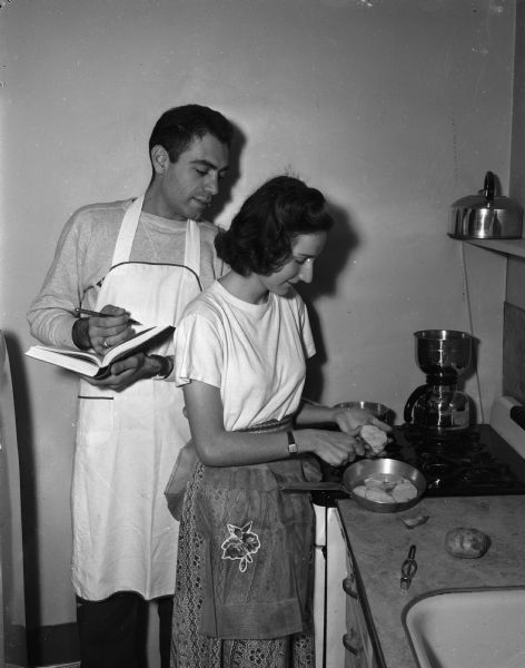 Dad Farmanfarma and his wife, Sylvia, in their kitchen in their home that has Swiss, Persian and American influences.