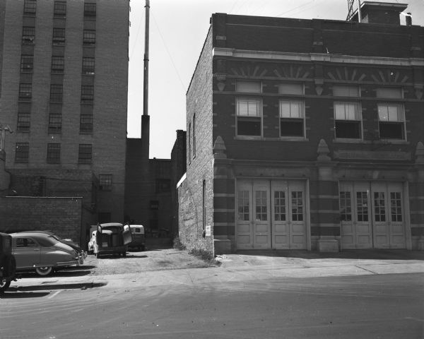 Madison's Central Fire Station, 18-20 South Webster Street. On the left is the adjacent alley and the back of the Tenney Building.