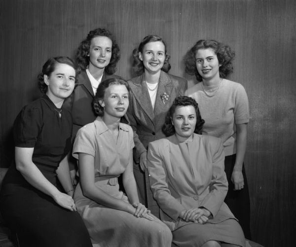 Officers of the University of Wisconsin Dames club for 1948. Seated  from left to right are: Mrs. L.R. White; Mrs. Marvin D. Whitehead;  Standing from left to right are: Mrs. Richard (Josephine P.) Andree; Mrs. Milo Tesar; Mrs. Robert Harris; and Mrs. Robert (Evelyn H.) Gunderson.