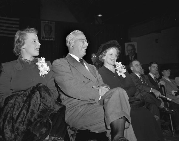 California Governor Earl Warren and his family at a rally at the University of Wisconsin stock pavilion where Gov. Warren made a half-hour talk in his bid for the vice-presidency. Pictured left to right are: Virginia, the Warrens' 19-year-old daughter, Gov. Warren, and Mrs. Warren.