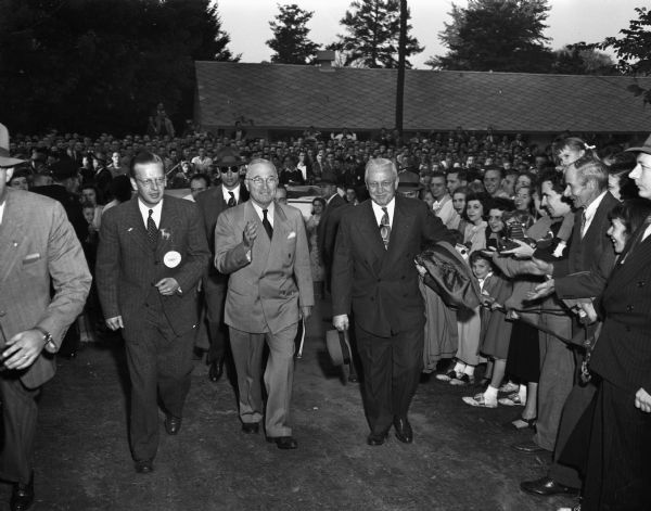 Left to right are: Carl Thompson, Stoughton, Democratic candidate for governor; Harry S. Truman, President, and Democratic candidate for the presidency; and Oscar Rennebohm, Republican governor of Wisconsin.