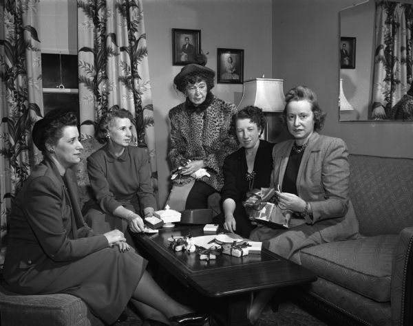 Making preparations for an inter-city meeting of Zonta district VI, at the Park Hotel, are members, left to right: Miss Ella Beerkircher, Miss Alice L. Cummings, Mrs. Isabelle R. Palm, Mrs. Helen T. Mullarkey, president, and Mrs. Mack (Mildred K.) Mitchell, chairman of the inter-city meeting.