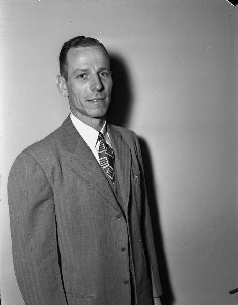 Waist-up portrait of George A. London, Wichita, Kansas police officer, who was interviewed for the Madison Police Chief job.