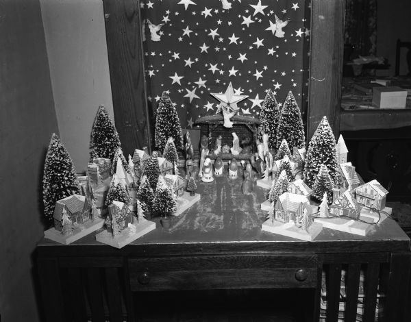 A Christmas nativity scene set up on a table in the home of Mrs. Mathilda Butler, 2642 East Dayton Street. She and her three children have been setting this scene up and adding to it for ten years.