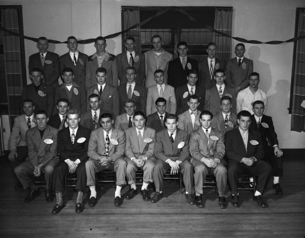 Group portrait of the 1948 All-State High School Football Squad at the annual governor's luncheon at Christ Presbyterian Church.