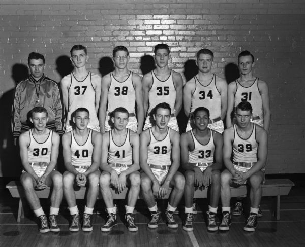 The Central High School basketball team will play West High School in the Big Eight Conference basketball race. West is in second place while Central is in third place.
The team members are: first row, Billy Mischke, Al Lindauer, Jim Conner, George Michalson, Jim MacDonald, Robert Lee.
Second row: Coach Bobby Alwin, Jack O'Brien, Jack Patzer, Jack O'Brien, Jack Patzer, Bob Patzer, Robert King, and Walter Lindauer.
Not pictured are: Jim Waters and Hugh Stamps.