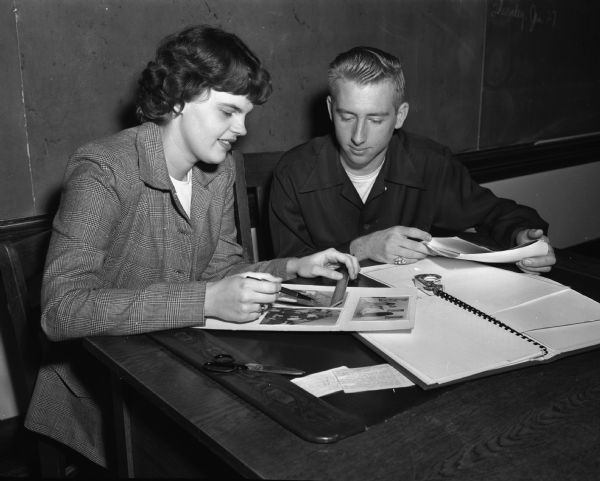 Etta Mae Geier and Clayton Bossart, co-editors of the <i>Crusader</i>, the Edgewood High School yearbook, working on the "dummies" for the annual publication.