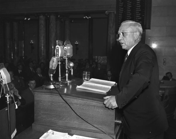 Governor Oscar Rennebohm addressing a joint meeting of the Wisconsin legislature as it convened for it's 69th legislative session.