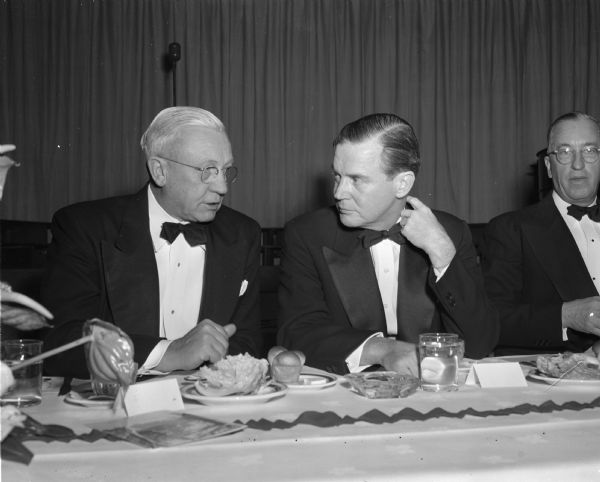 Governor Oscar Rennebohm with main speaker Philip Reed of the General Electric Company at the University of Wisconsin centennial birthday banquet at the Great Hall of the Memorial Union.