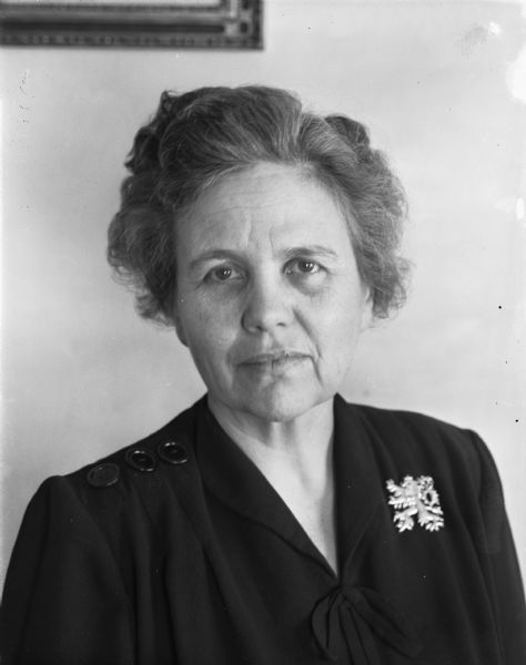 Portrait of Mrs. W.C. (Rosamond) Rice, Jr., 2212 Hillington Green, Chair of the UN (United Nations) committee for the Wisconsin League of Women Voters. Mrs. Rice's group studies the functions and accomplishments of the UN and provides speakers to other clubs and groups who want to learn more about the UN.