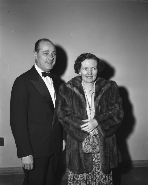 University of Wisconsin Athletic Director Harry Stuhldreher, and his wife Mary, at the premiere of the Alfred Lunt-Lynn Fontanne production of "I know my Love" at the Wisconsin Union Theater.