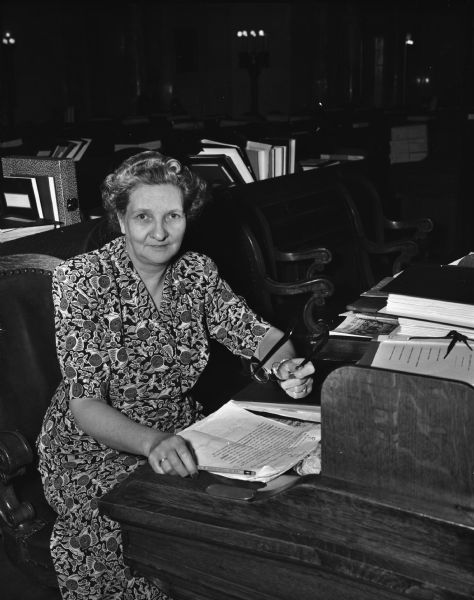 Portrait of Representative Sylvia H. Raihle, Republican, Chippewa Falls, Wisconsin, at her desk in the Assembly Chambers.