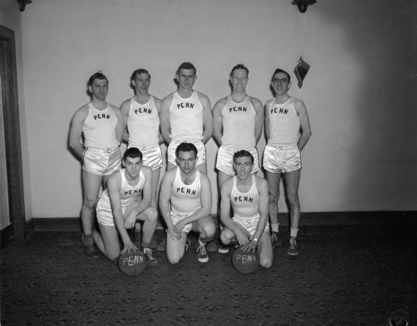 Penn Electric recreational basketball team won all of its games for the season, and advanced to the first round game of the 24th annual municipal city basketball tournament. The players are, left to right, front row: Jerry Lochner, Manager Glen Lokken, and Bud Borchert; back row: Mike (Hemmingson?), Gene Dubois, Jerry Hill, Harry "Hap" Husebo, and Stan Trach.