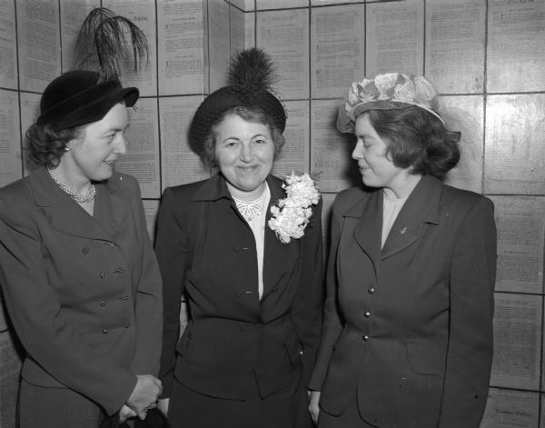 Mrs. Lettie P. Trefz, national vice-president of Pi Lambda Theta, stands between Evelyn Simonson (left), vice-president of the Wisconsin chapter, and Doris Platt, president. Pi Lambda Theta was a national honorary group for women in education.