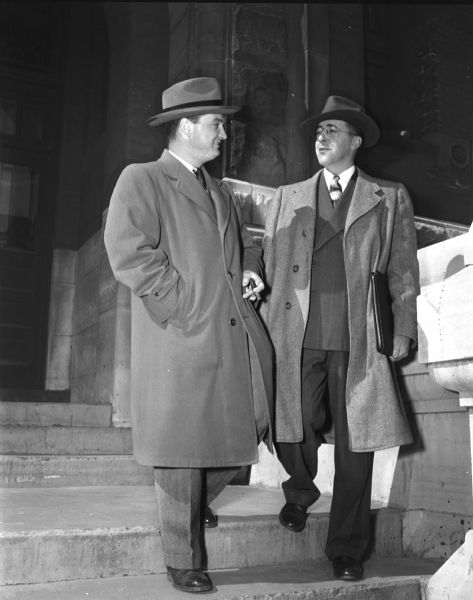 Attorneys John Brickhouse and James Karn, members of the 1949 Madison Community Chest budget committee, standing on the steps of the Dane county court house. Mr, Brickhouse is a member of the East Side Businessmen's Association.