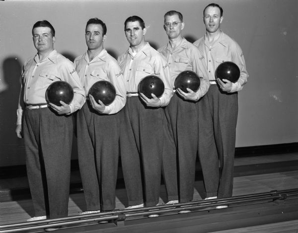 Group portrait of five men on the Madison Brass Works bowling team.