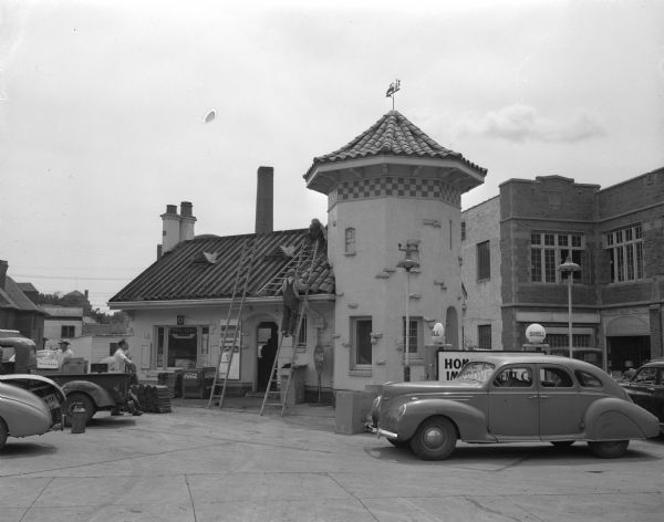 The Shell filling station, 341 State Street as workers are starting to tear it down. The station, built in 1924 and at one time adjudged the second most beautiful gasoline station in the United States, will be replaced by a modern filling station with three bays.