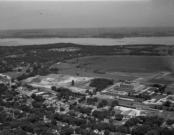 Aerial photograph looking north across University Avenue at Forest Products Laboratory and the construction site for the Veterans Administration hospital.
