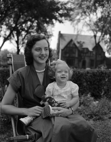 Betty (Mrs. Charles O.) Iltis with daughter Barbara Kay at the home of her husband's parents, Prof. and Mrs. Leon L. Iltis.