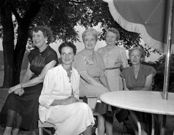 Members of the planning committee for the Wisconsin Women's Golf Association state tournament to be held at the Maple Bluff Country Club. From left are Mrs. H. Lewis (Isabelle) Greene, chairman of hostesses; Mrs. George H. (Sarah) Johnson, chairman of the social committee; Mrs. George J Leonhard, chairman of the locker and powder room committee; Mrs. E.J.B. (Selma) Schubring, a member of the state rules committee; and Mrs. Joseph B. (Esther) Hermsen, chairman of the printing committee.