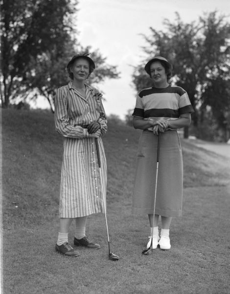 Pictured at the Maple Bluff Country Club are Mrs. John Clauder of Milwaukee Westmoor Club, left, and Mrs. Marian Callahan, Madison, Blackhawk Club, who will participate in the Wisconsin Women's Golf Association Tournament held at Maple Bluff. Mrs. Clauder was the champion in 1942 and 1948, and Mrs. Callahan was champion in 1934.