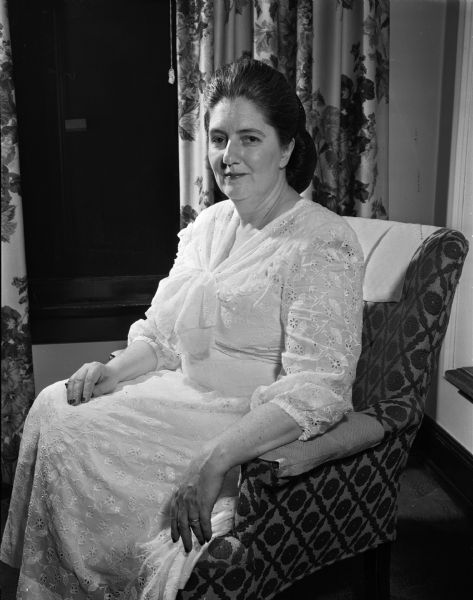 Portrait of Mrs. Joseph R. Farrington, Washington D.C., president of the National Federaton of Women's Republican Clubs, in her suite at the Hotel Loraine.