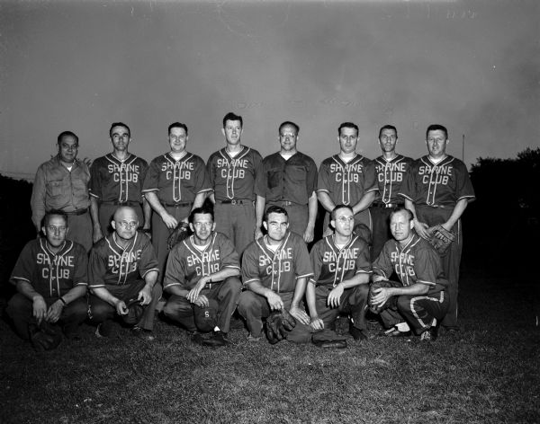 Group portrait of the Zor Shrine Club softball team in uniform, winners of the annual charity ball game at Breese Stevens Field.  Back row, left to right: Coach Matt "Sonny Groth, Hal Metzen, Don Cowan, Manager Lyle Andrews, Judge George Kroncke, Jr., Paul Knabe, Del Hauser, and Ted Rundell. Front row: Earl Epstein, Les Ogilvie, Hal Richter, Hal Lauz, George Cnare, and Lloyd Kohl.