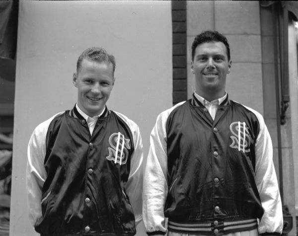 Jim Westby (left) and Bob Goodman, members of the Security State Bank softball team pose for a portrait. The men were absent when the group portrait was taken.