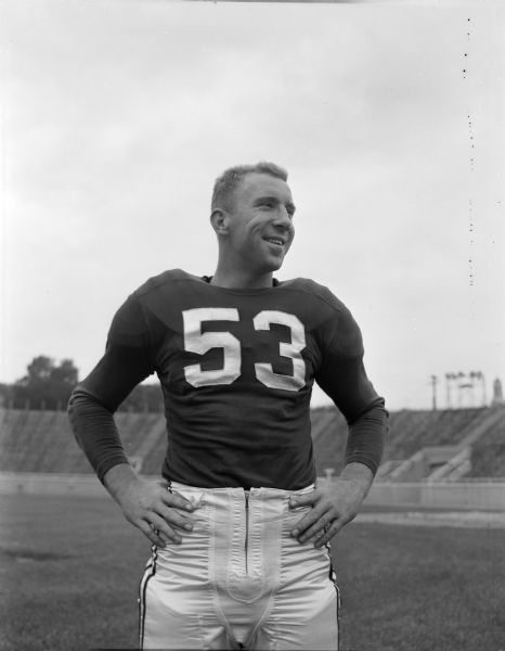 Portrait of Robert "Red" Wilson, captain of the University of Wisconsin football varsity squad. Wilson, whose number is 53, is in his third year as a regular player, and will play defensive right end as well as defensive center this year. Wilson formerly played center on offense.