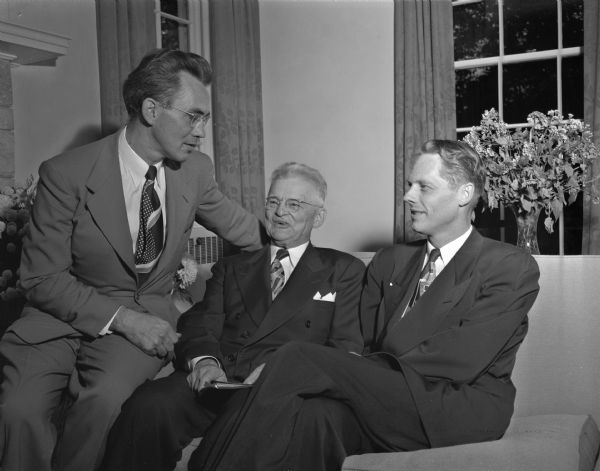 Three men instrumental in the building of the recently built University of Wisconsin Lutheran Student Home.  Shown at the dedication of the home, left to right: Rev. Henry Hetlan, Lutheran student pastor at the university; Dr. O.J. Wilke, Madison, president of the Wisconsin Lutheran Student Foundation; and Rev. Morris Wee, former pastor of Bethel Lutheran Church, Madison.
