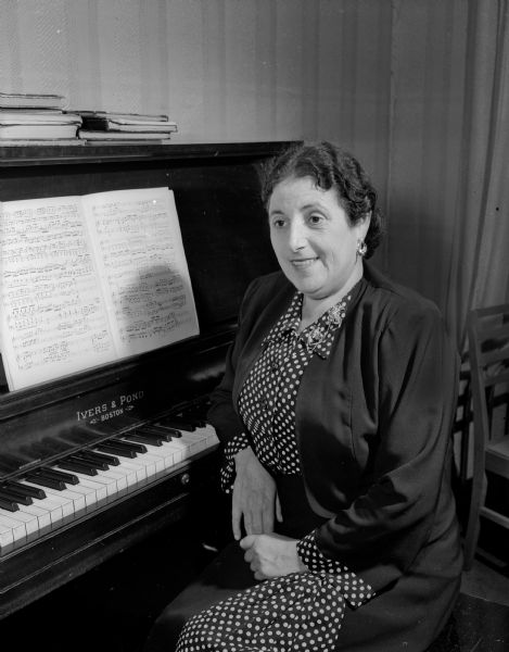 The Madison Business and Professional Women's club celebrates National Business Women's Week by honoring some of its members. Pictured is Ms. Maria Syllm, a professional pianist, who operates the Maria Syllm Piano Studio, 27 West Main Street.