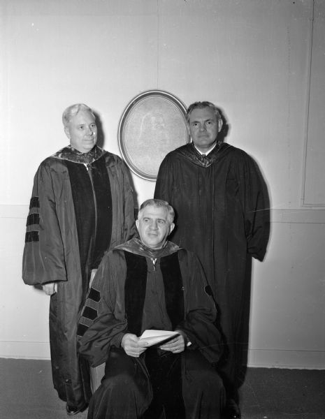 Three Methodist Bishops, honored guests at a national meeting to promote the program, "Advance for Christ and His Church". Shown in clergy robes: seated, H. Clifford Northcott, resident bishop of the Wisconsin area; standing at left, Ray Short, bishop of the Florida and Cuba areas; standing at right, Bishop William C. Martin, Texas.  Nearly 1500 people attended the meeting.