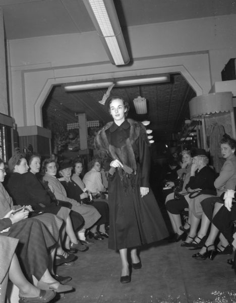 Barbara John models a 1949 outfit at the Simpson 40th Anniversary Style Show.