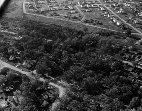Aerial photograph of the Glenway Park area on Madison west side, looking north from Monroe Street across the Illinois Central Railroad. Glen Drive can be seen at the top of the photograph.