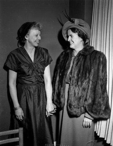 Miss Dagne Hougstad, 480 N. Baldwin Street, left, president of the Madison alumnae group of Theta Sigma Phi journalism sorority, and Mrs. Betty Hinckle Dunn, Chicago, national president of the sorority, were photographed at a dinner in honor of Mrs. Dunn.