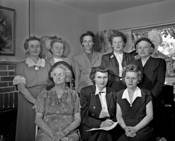 Members of the planning committee for the "old time get-together fun night" sponsored by the Queen's Guild of Queen of Peace Catholic Church. Seated, left to right, are: Mrs. Henry (Florence) Topp, Mrs. Robert (Marguerite) Denton, and Mrs. Dudley (Loretta) Hughes. Standing, left to right, are: Mrs. J.E. (Mary) Stallard, Mrs. George Richardson, Mrs. Arthur (Irene) Topp, Mrs. George (Frances) Forster, and Mrs. Arthur (Marie) Purcell.